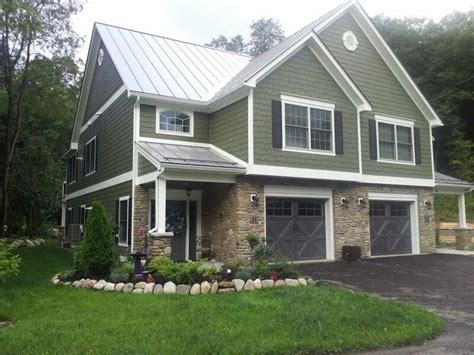 grey house with green metal roof|green gray exterior house paint.